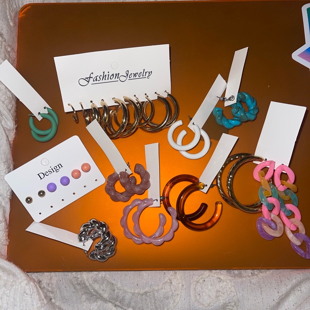 Brand new mix match bundle of colorful hoop earrings.